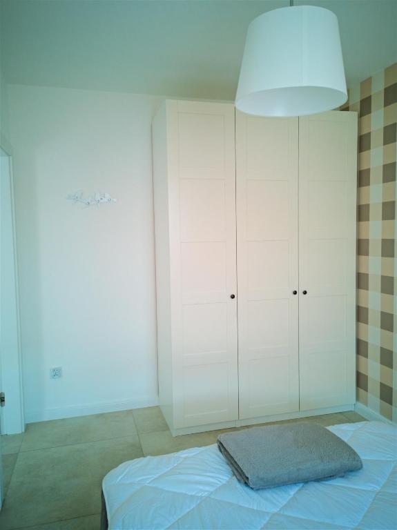 Posteľ alebo postele v izbe v ubytovaní Sea Cliff Apartment Rewal