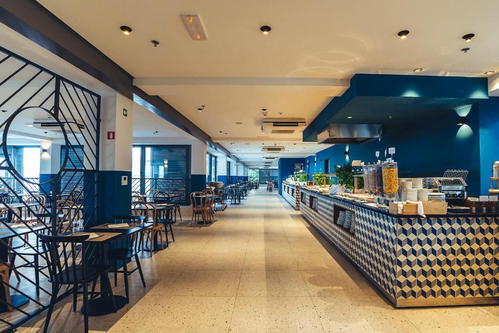 Reštaurácia alebo iné gastronomické zariadenie v ubytovaní MORENIA All Inclusive Hotel