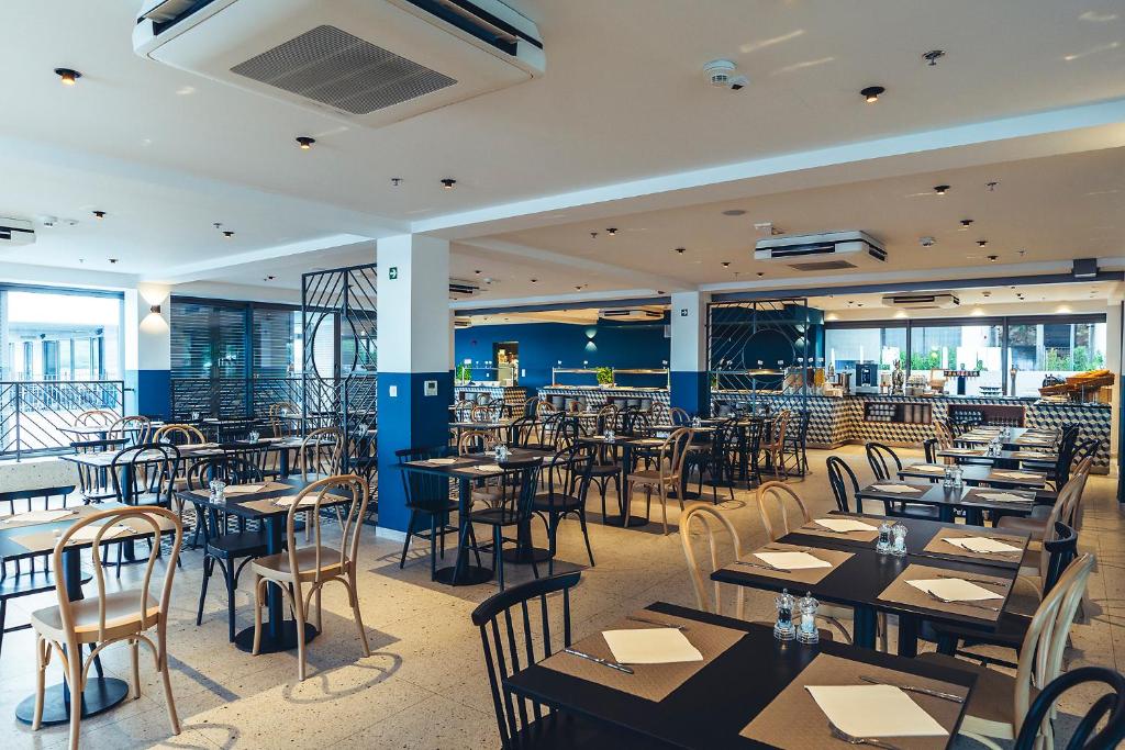 Reštaurácia alebo iné gastronomické zariadenie v ubytovaní MORENIA All Inclusive Hotel