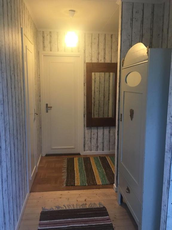 Postel nebo postele na pokoji v ubytování Kolstigenhus
