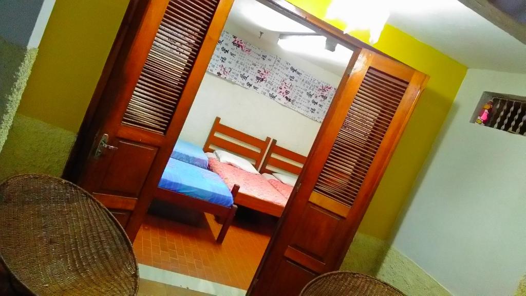 Postel nebo postele na pokoji v ubytování Praieiro Hostel Albergue