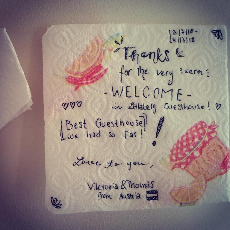 a note with writing on it with butterflies on it at Litlabjarg Guesthouse in Hrafnabjorg