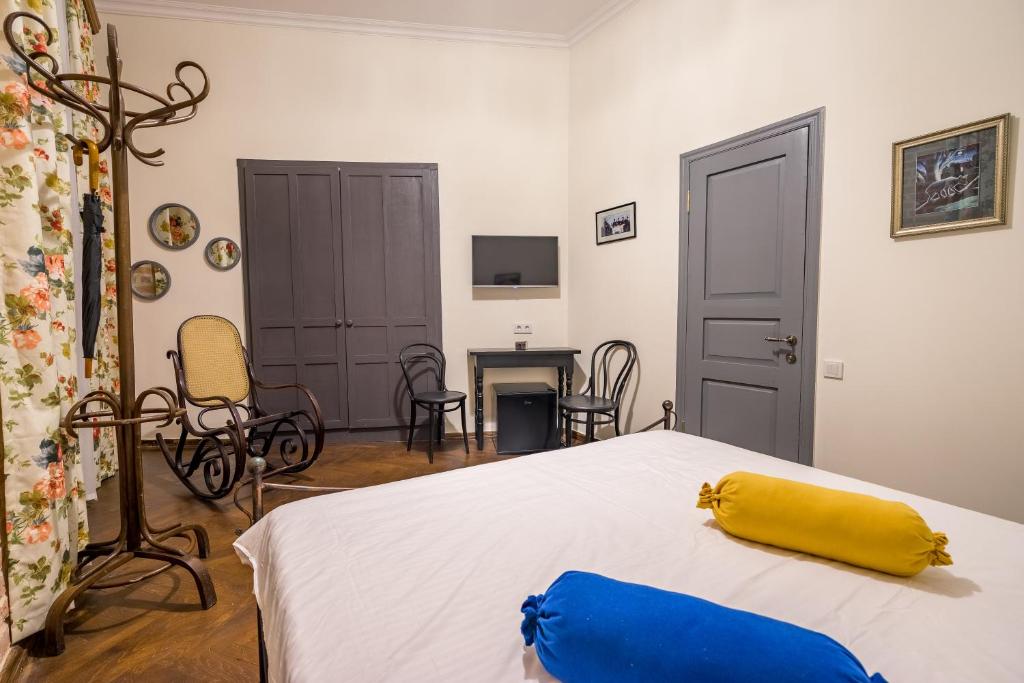 Postel nebo postele na pokoji v ubytování Doors Meidan Design Hotel