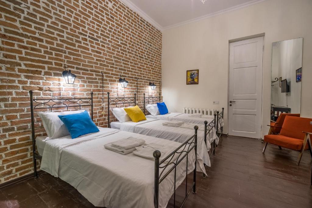 Postel nebo postele na pokoji v ubytování Doors Meidan Design Hotel