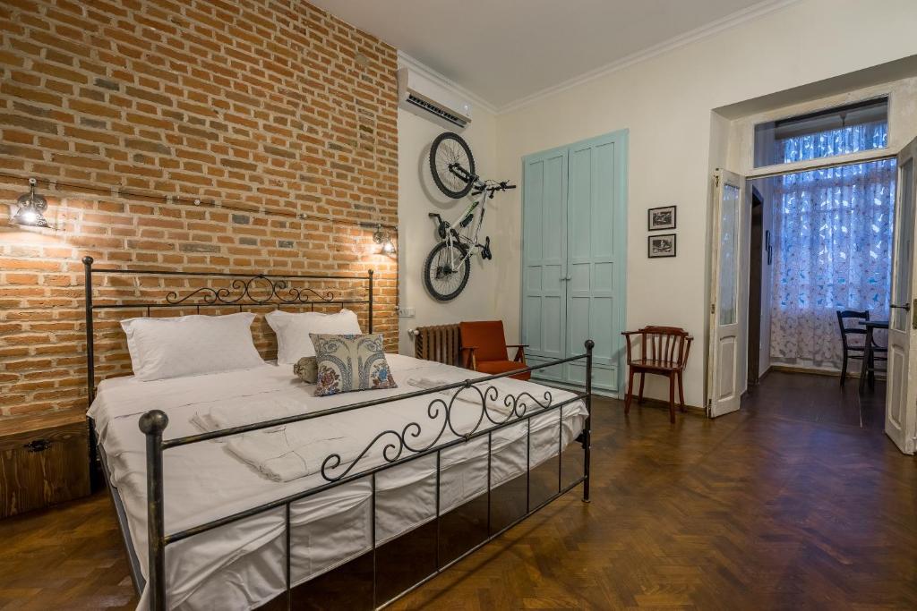 Postel nebo postele na pokoji v ubytování Doors Meidan Design Hotel