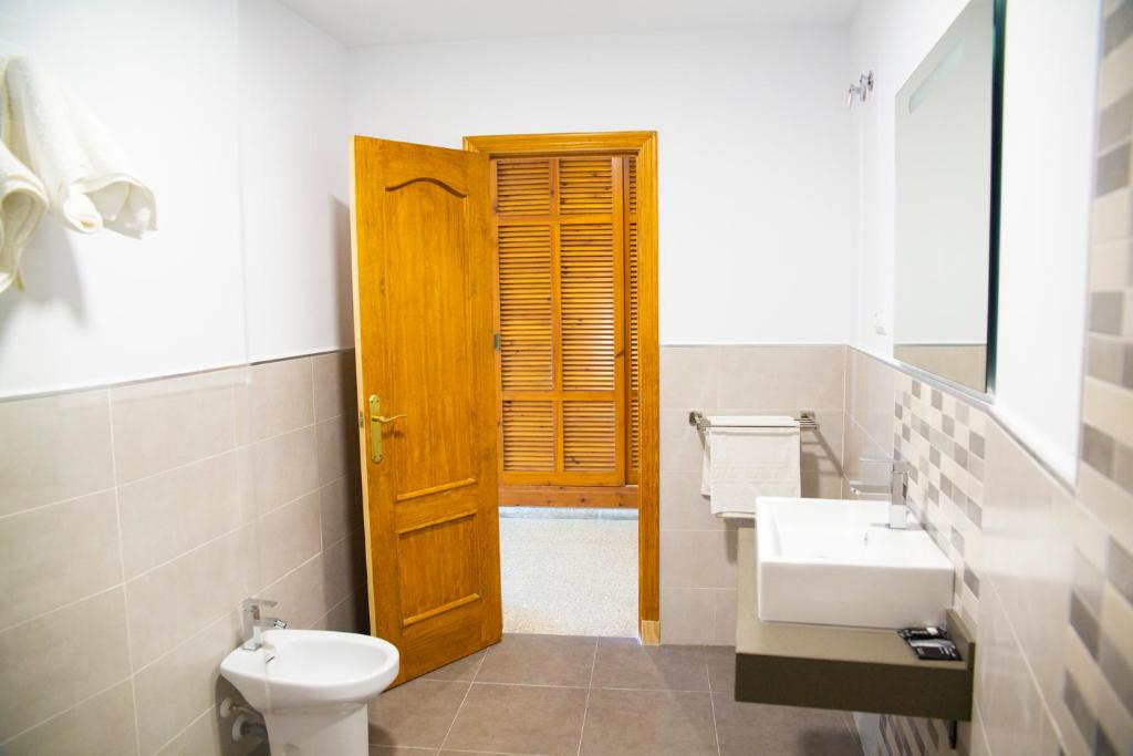 Koupelna v ubytování Hotel Salambina