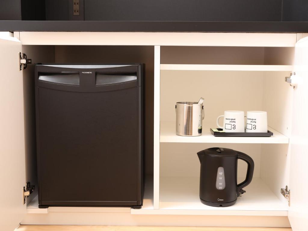 Kuchyň nebo kuchyňský kout v ubytování hotel androoms Nagoya Sakae