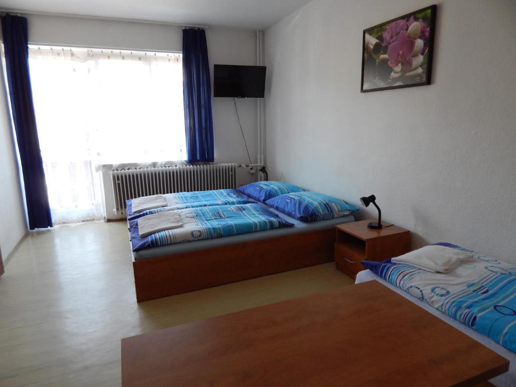 Posteľ alebo postele v izbe v ubytovaní Privat Severka