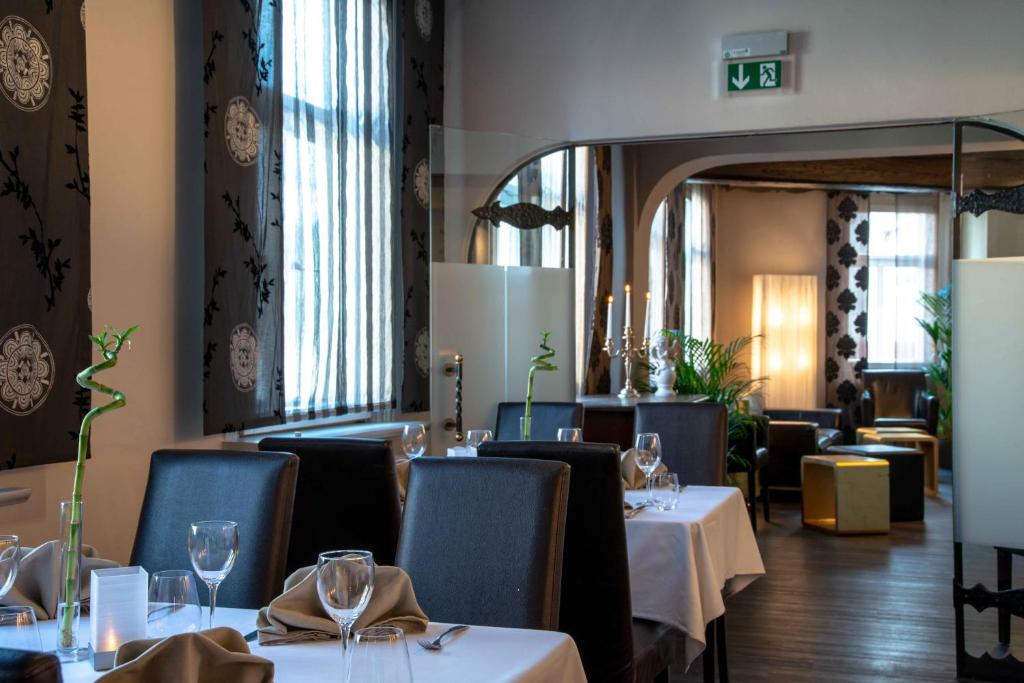 Ein Sitzbereich in der Unterkunft Hotel Engel
