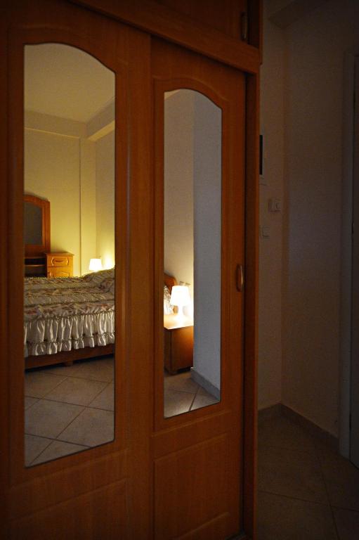 Postel nebo postele na pokoji v ubytování Rooms Nancy