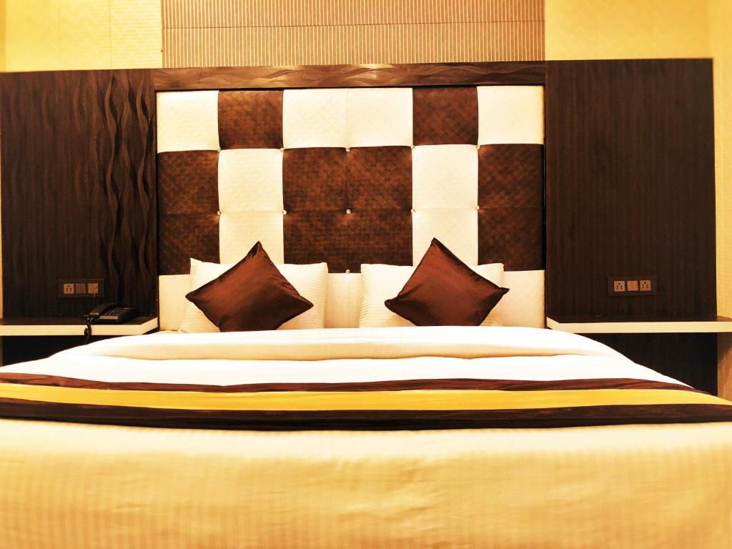 Cama o camas de una habitación en Hotel Pardesi's