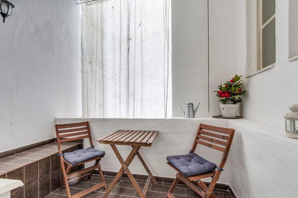 Posedenie v ubytovaní Fashion Street Luxury Apartment