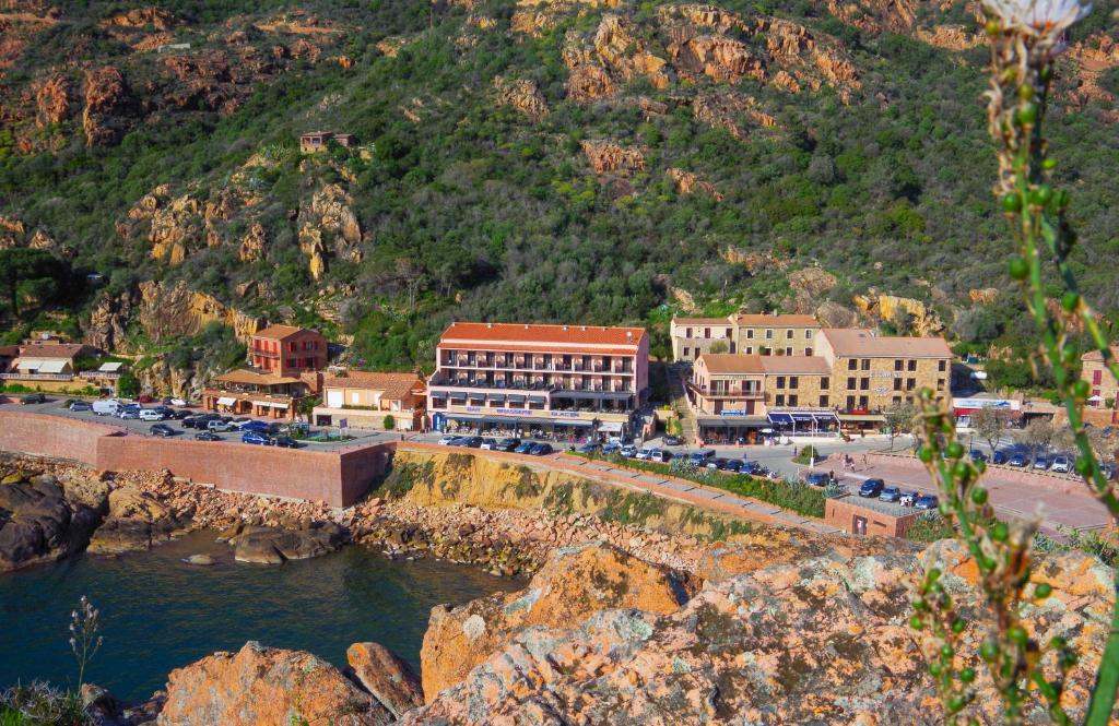 a town on the side of a mountain at Les Flots Bleus in Porto Ota