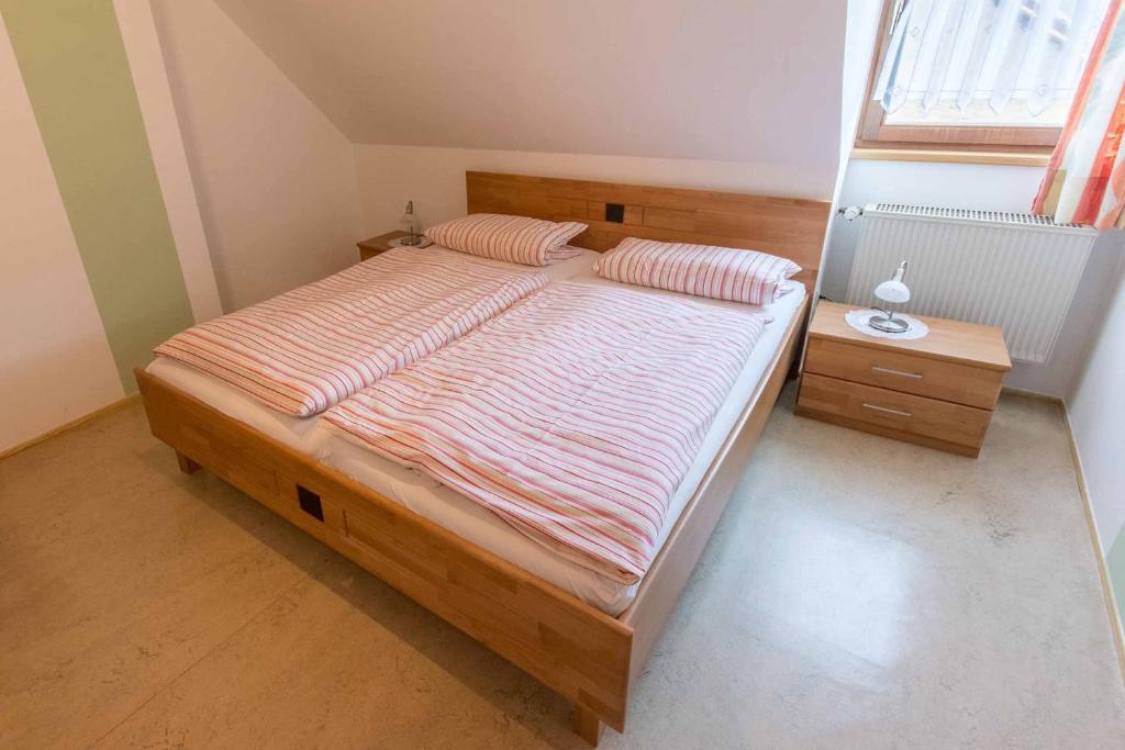 Postel nebo postele na pokoji v ubytování Feriendorf Nehmeier