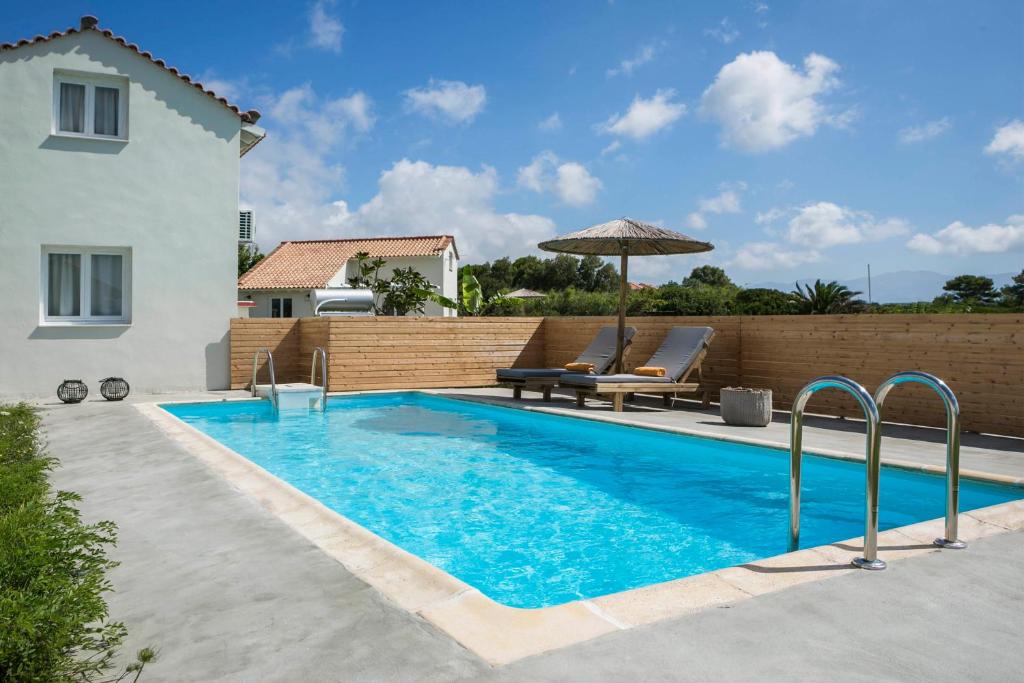 Πισίνα στο ή κοντά στο Kymata Bohemian Villas