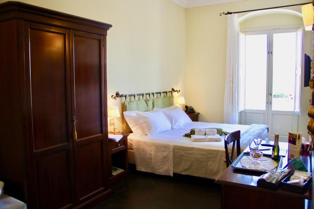 Il Duomo Relaisにあるベッド