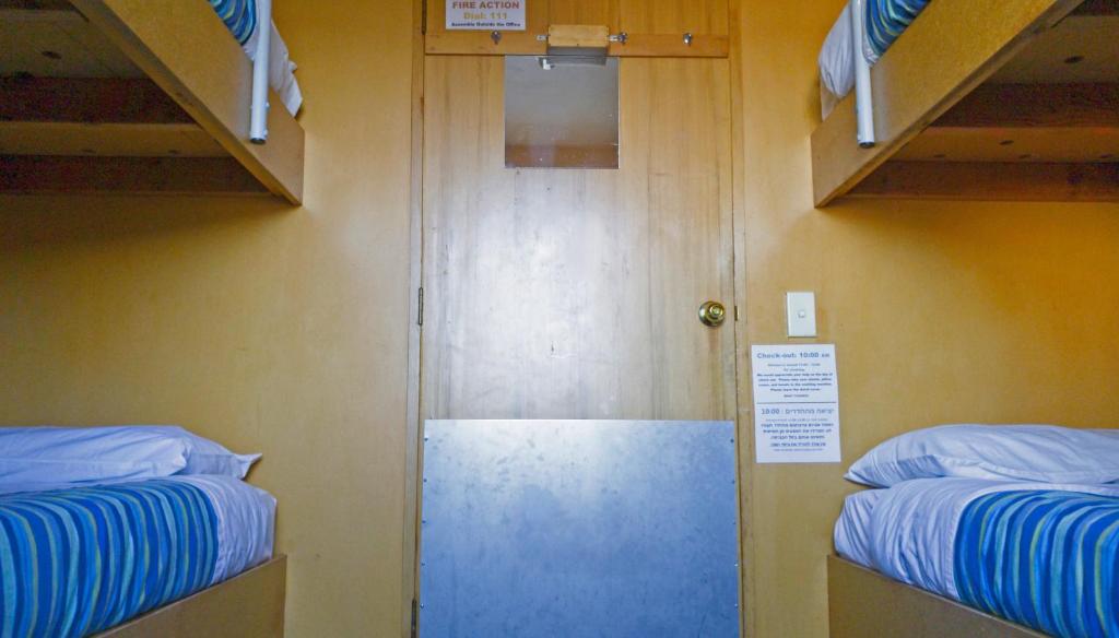 Postel nebo postele na pokoji v ubytování Zula Lodge