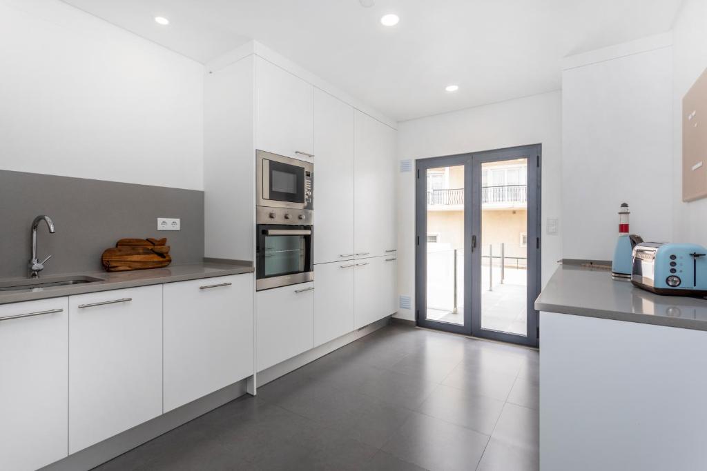 Een keuken of kitchenette bij You and the sea