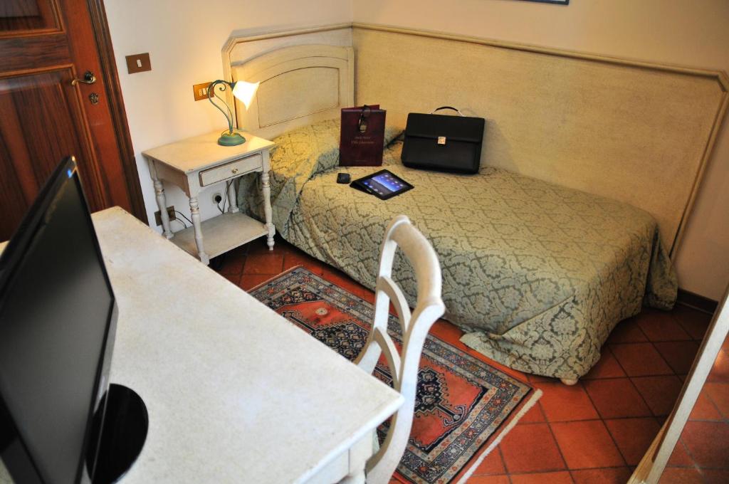 TV a/nebo společenská místnost v ubytování Park Hotel Villa Giustinian