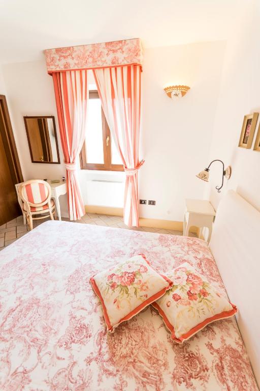Postel nebo postele na pokoji v ubytování Masseria Ruri Pulcra