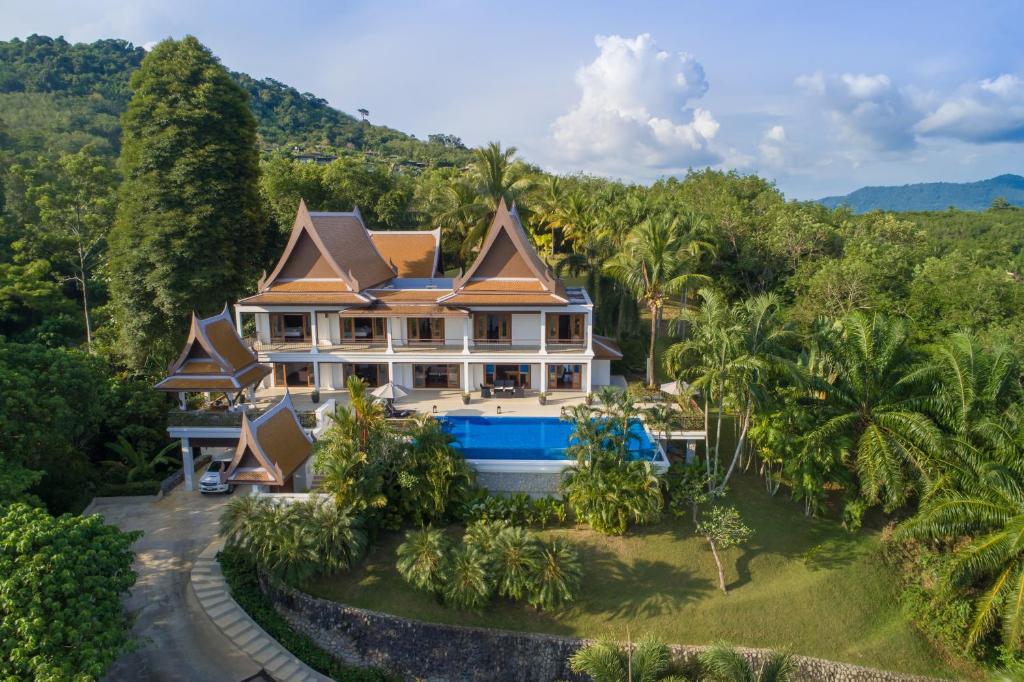 an aerial view of a house in the jungle at Vichuda Hills in Layan Beach
