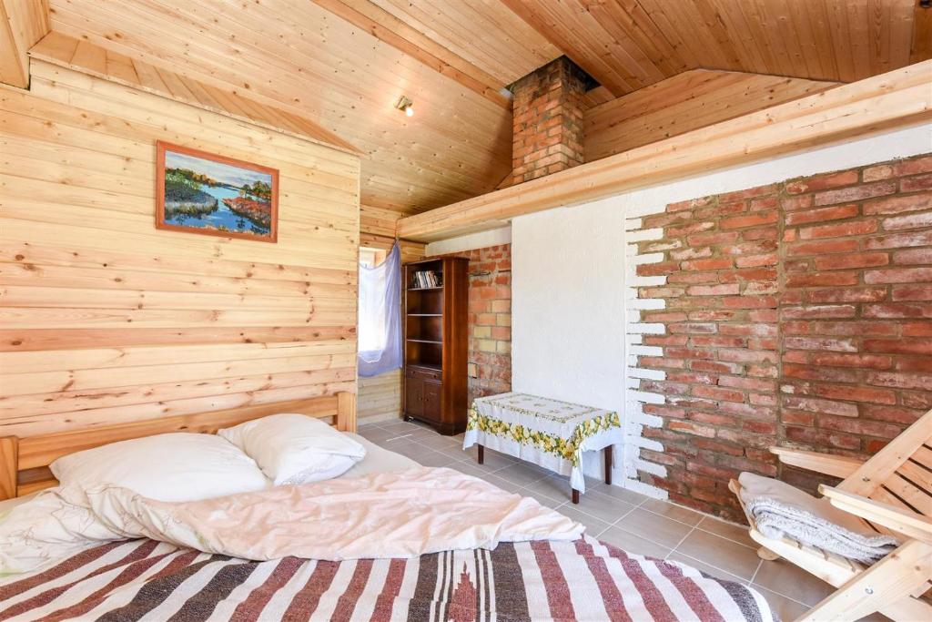 Ένα ή περισσότερα κρεβάτια σε δωμάτιο στο Avoti