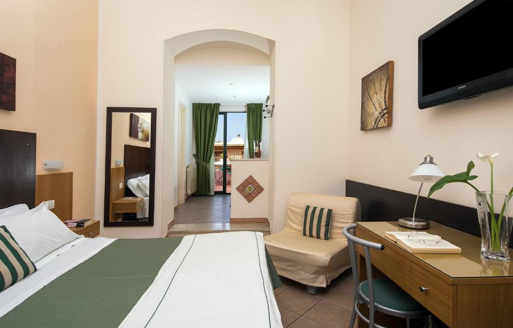 Postel nebo postele na pokoji v ubytování Hotel "La Pensione Svizzera"