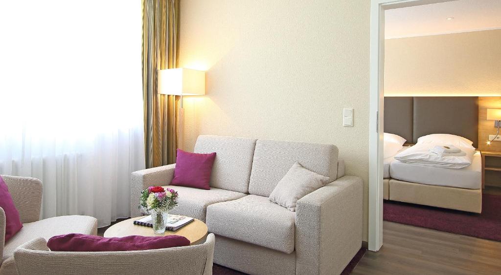Postel nebo postele na pokoji v ubytování Akzent Hotel Am Burgholz