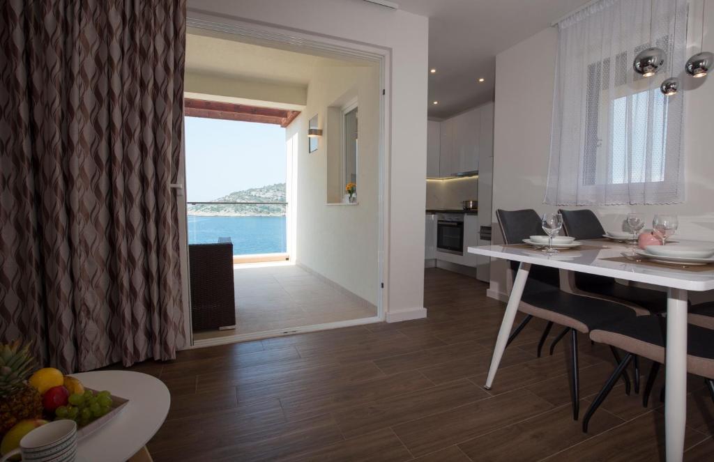 Kuchyň nebo kuchyňský kout v ubytování Apartments Lanterna