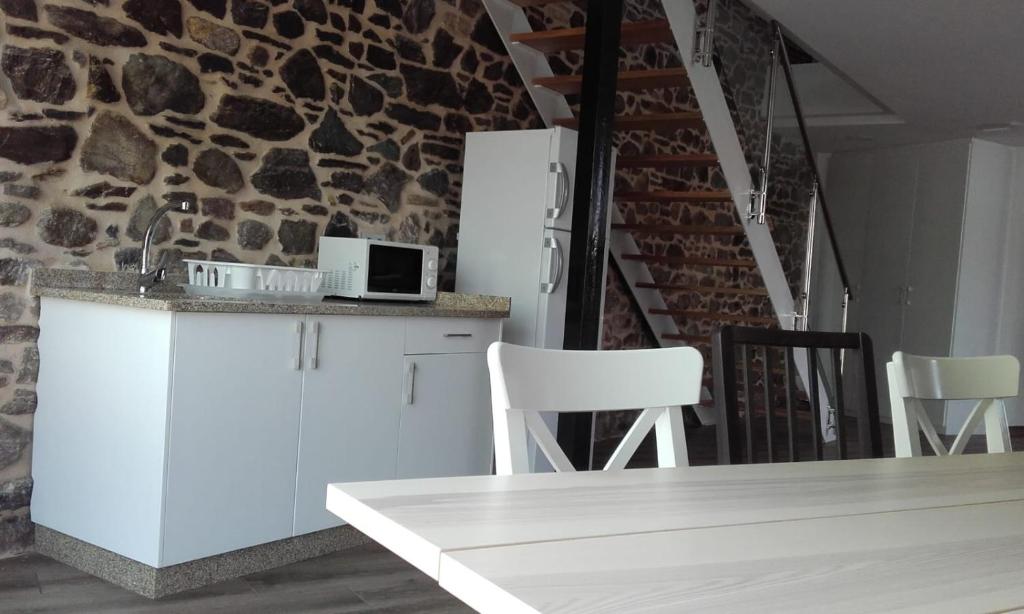Kuchyň nebo kuchyňský kout v ubytování Albergue Monte Aro