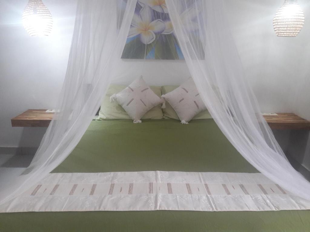 Postel nebo postele na pokoji v ubytování Cape Rose