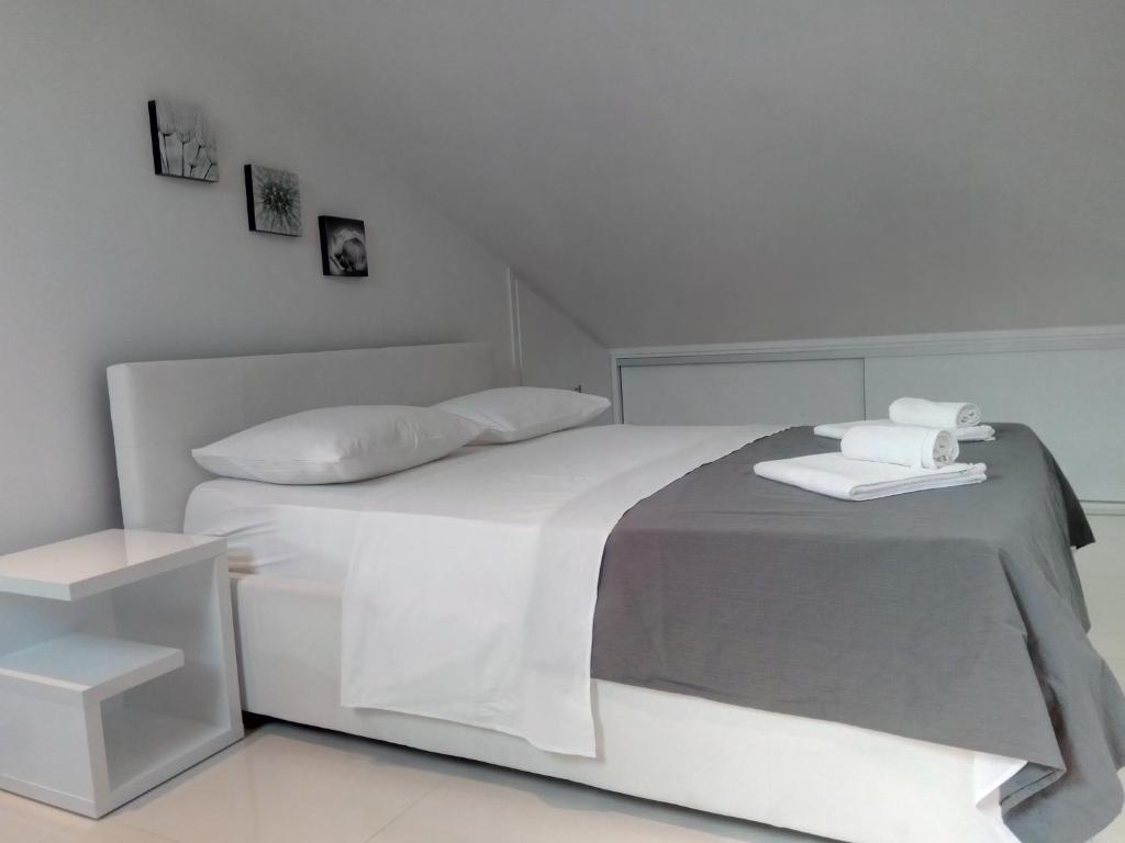 Postel nebo postele na pokoji v ubytování Apartment Marco