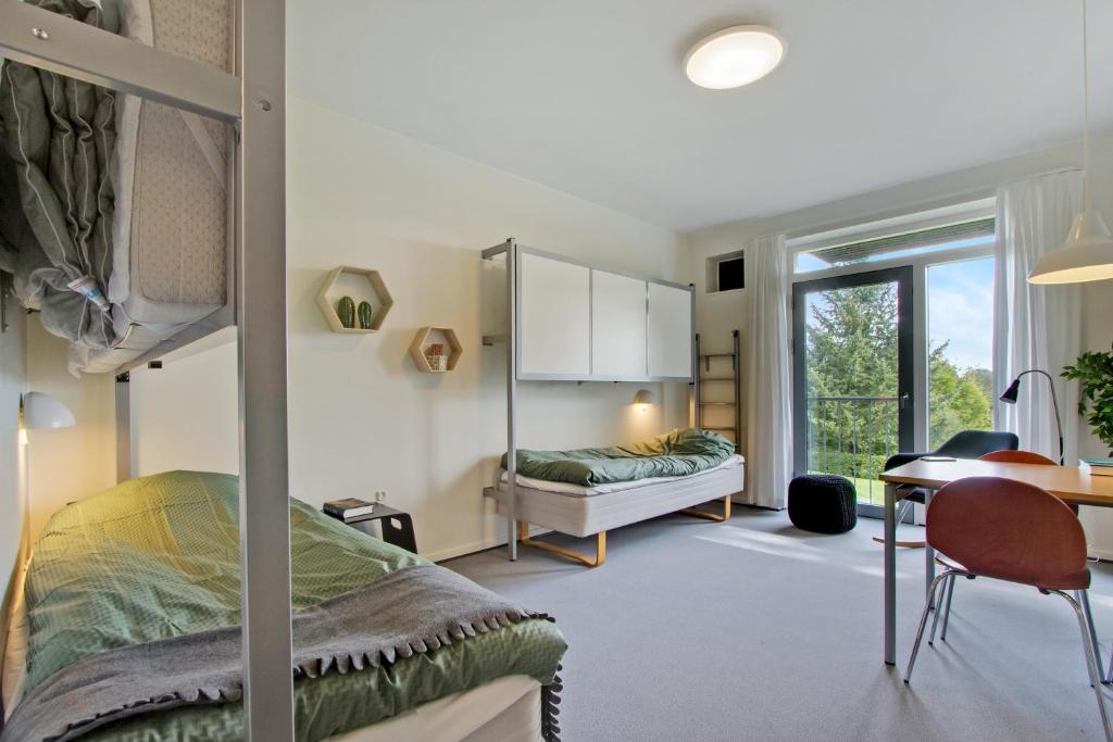 Postel nebo postele na pokoji v ubytování Danhostel Kolding