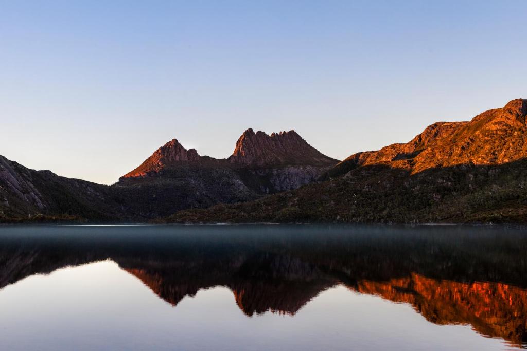 a view of a lake with mountains in the background at Discovery Resorts - Cradle Mountain in Cradle Mountain