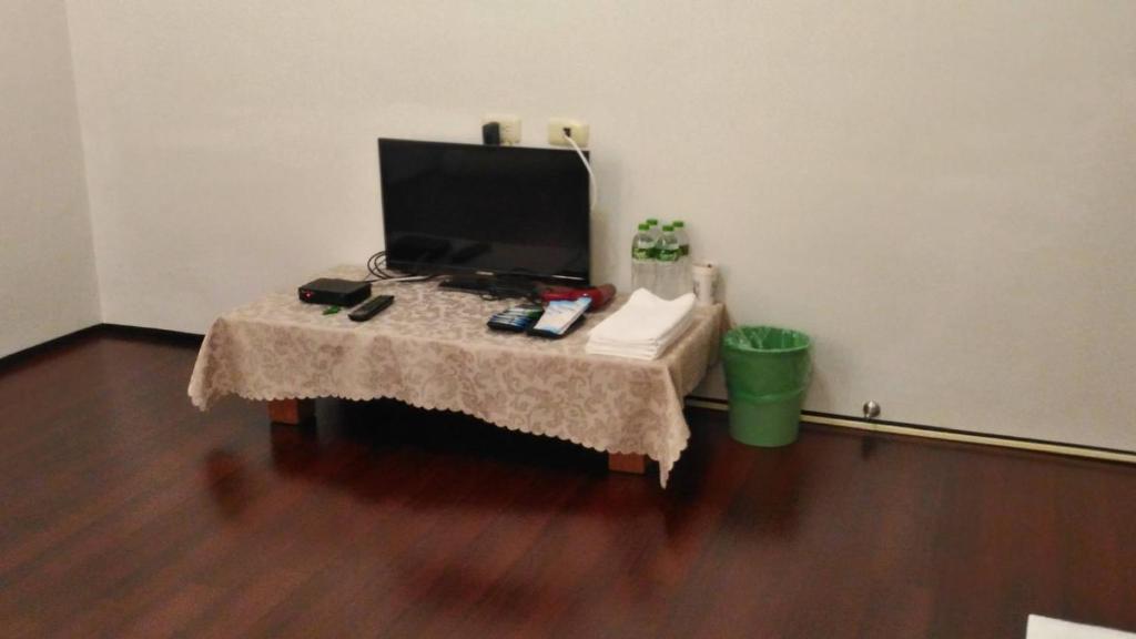 TV a/nebo společenská místnost v ubytování Flower Memory Homestay