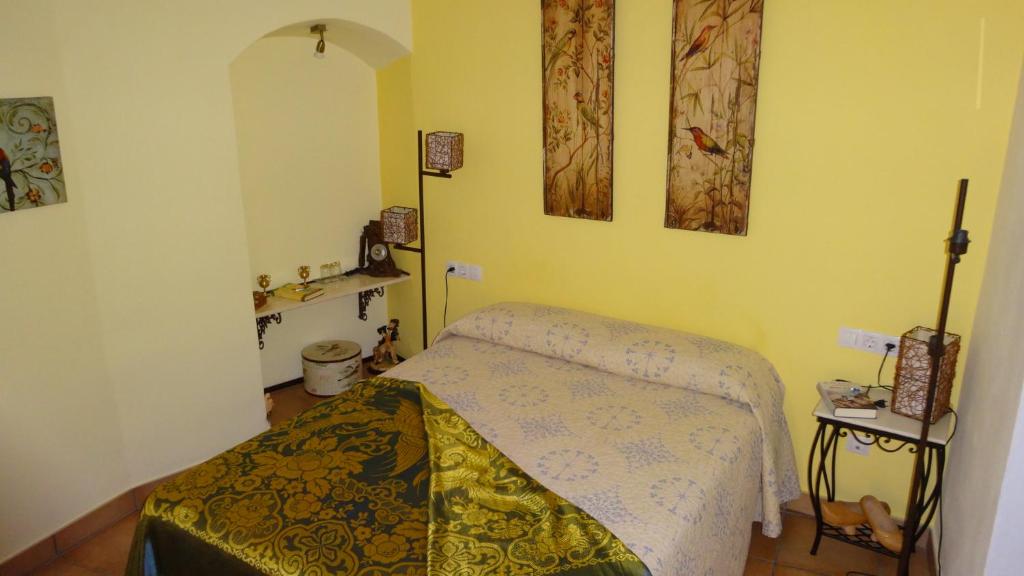 Postel nebo postele na pokoji v ubytování La Posada Del Infante