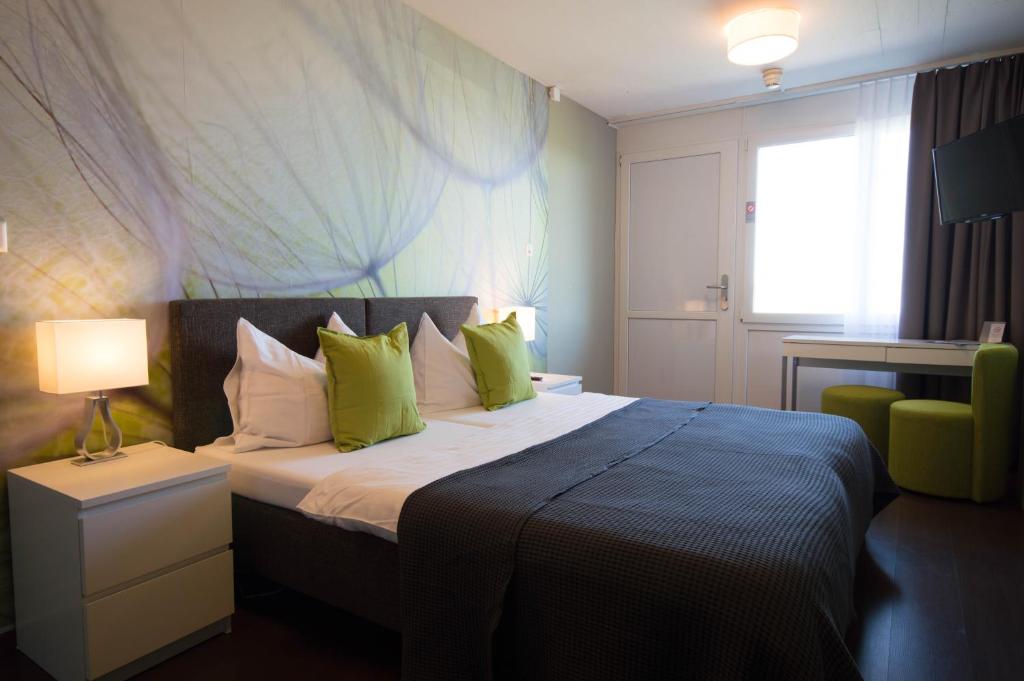 Postel nebo postele na pokoji v ubytování Hotel Bodensee-Arena