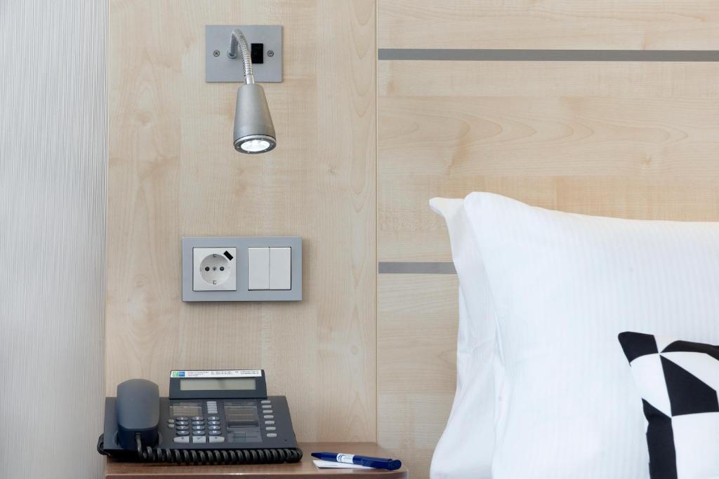 Postel nebo postele na pokoji v ubytování Holiday Inn Express Singen by IHG