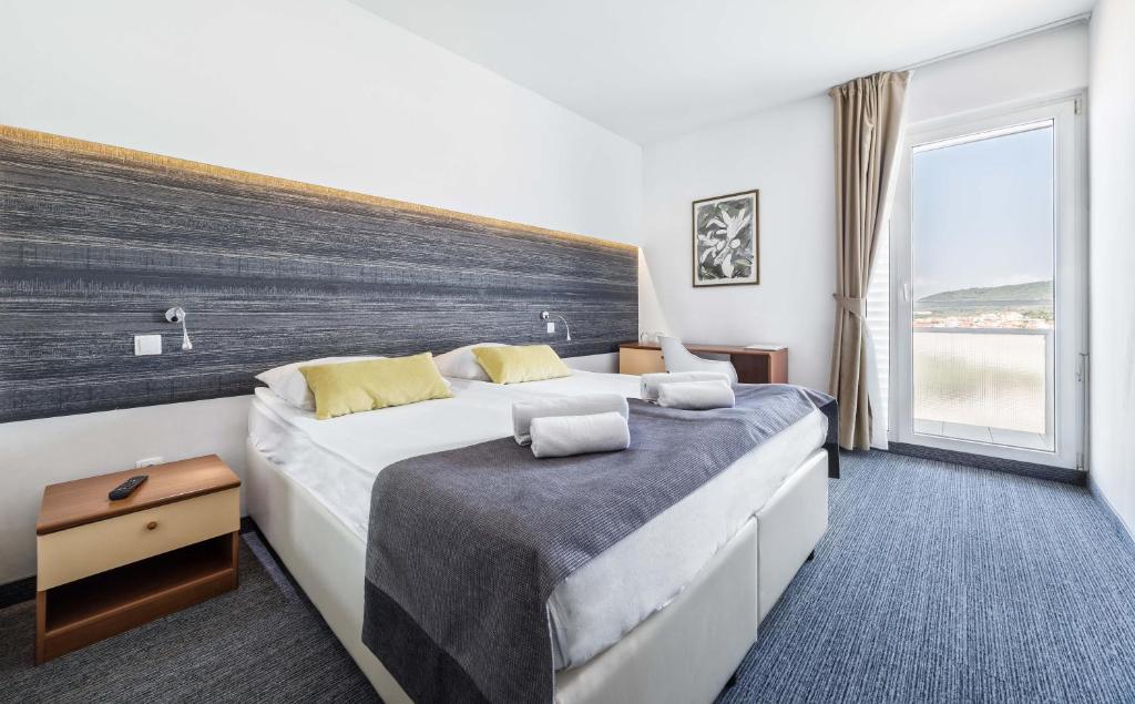 Posteľ alebo postele v izbe v ubytovaní Hotel Punta
