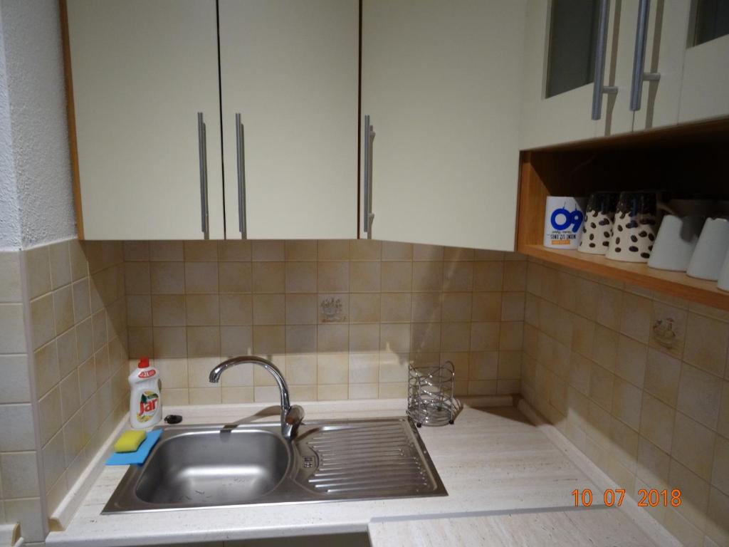 Kuchyň nebo kuchyňský kout v ubytování Apartmány Hágy L+L