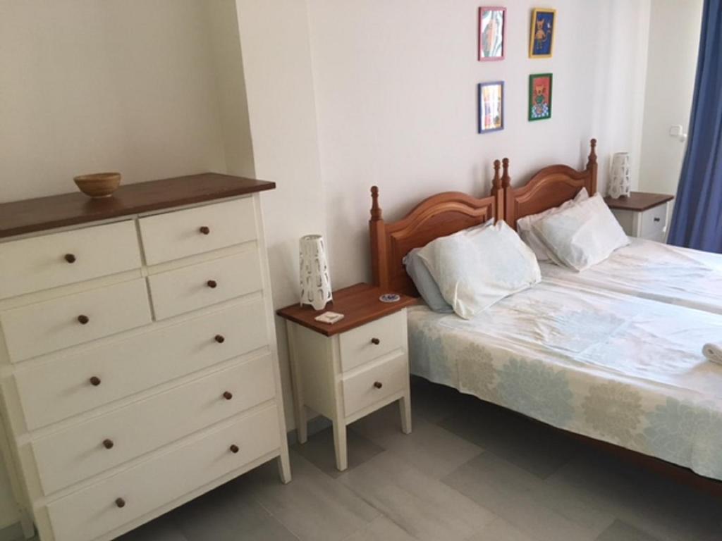 Postel nebo postele na pokoji v ubytování Villa El Gallo