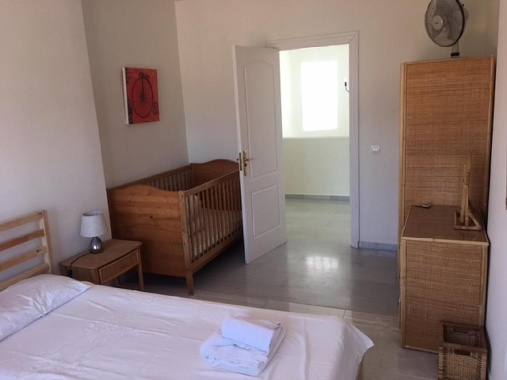 Postel nebo postele na pokoji v ubytování Villa El Gallo