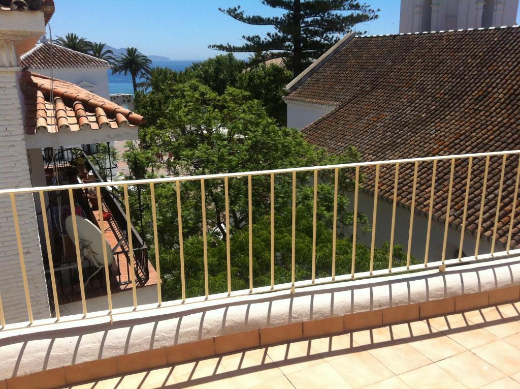 a fence on a balcony of a house at MIRADOR del BALCON DE EUROPA 1A - Nerja in Nerja