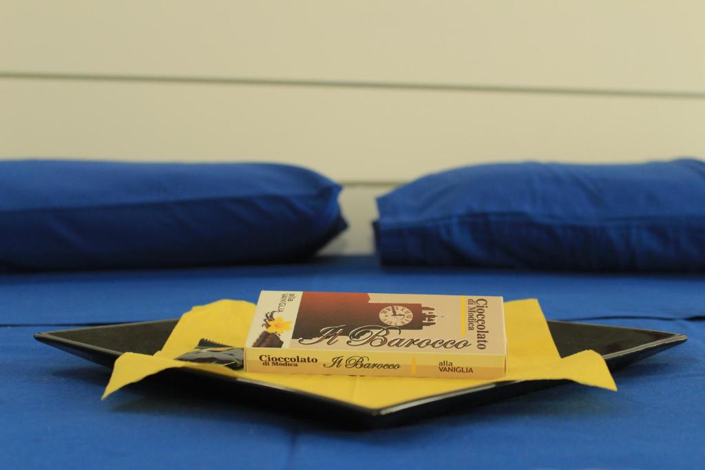 Postel nebo postele na pokoji v ubytování Il Barocco