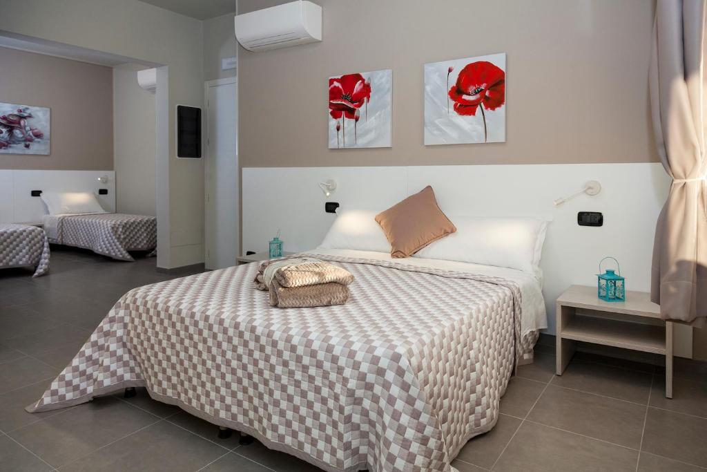 Posteľ alebo postele v izbe v ubytovaní Riviera HUB