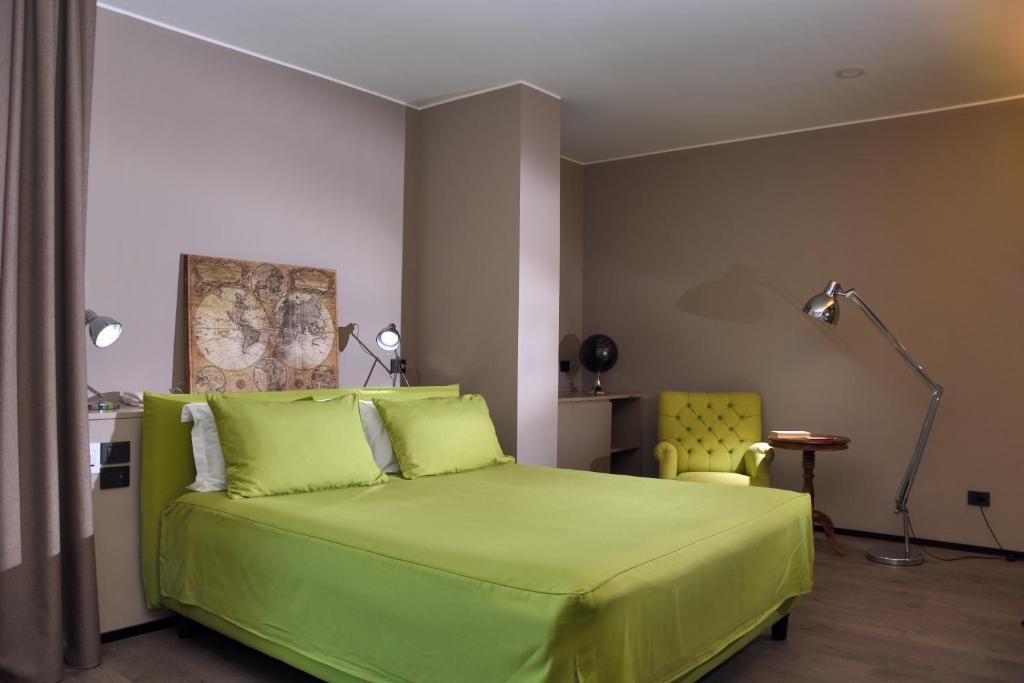 Postel nebo postele na pokoji v ubytování H2C Hotel Milanofiori