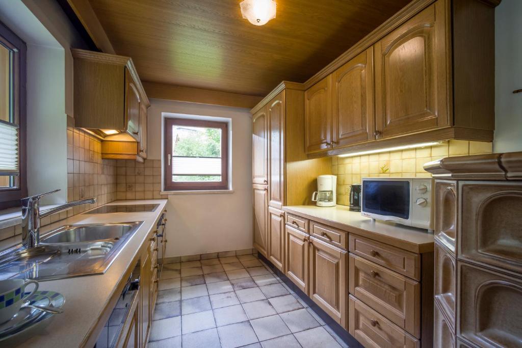 Kuchyň nebo kuchyňský kout v ubytování Haus Sageler
