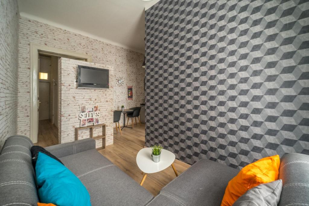 Televízia a/alebo spoločenská miestnosť v ubytovaní Susan Apartment near Blaha Lujza Square