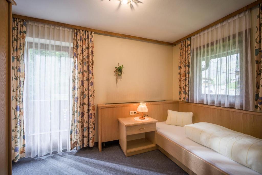 Postel nebo postele na pokoji v ubytování Haus Sageler