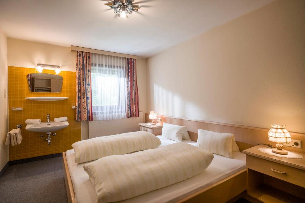 Postel nebo postele na pokoji v ubytování Haus Sageler